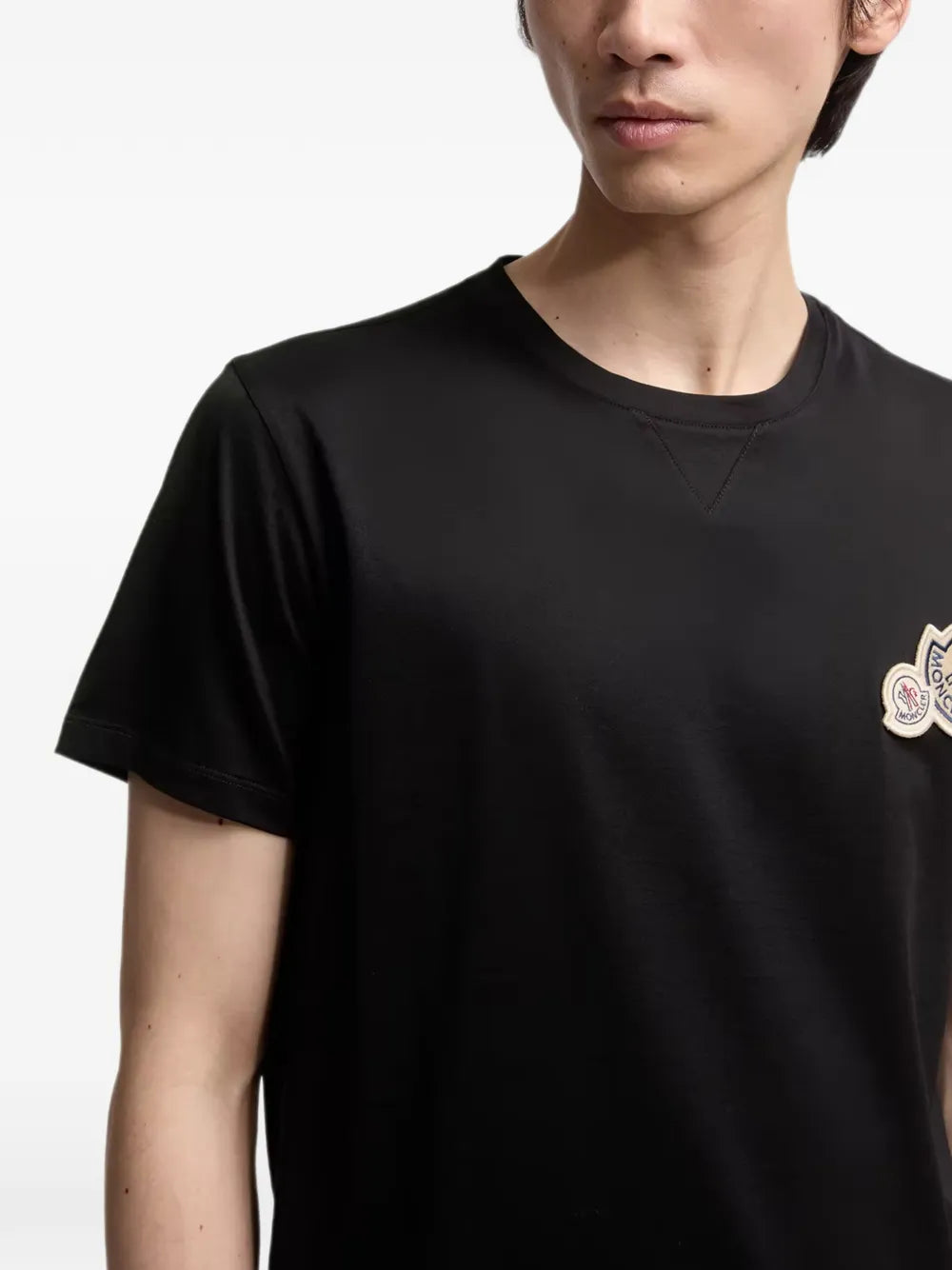 Camiseta com patch de logo duplo